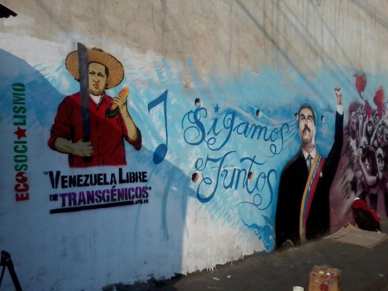 Wandbild in Barquisimeto. Links Hugo Chávez als Bauer, rechts Präsident Nicolás Maduro - "Wir machen zusammen weiter"