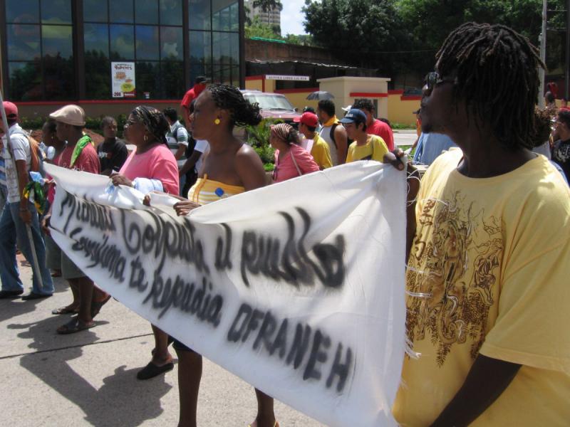 Protestaktion der Garífuna-Organisation OFRANEH gegen systematischen Landraub und Menschenrechtsverletzungen