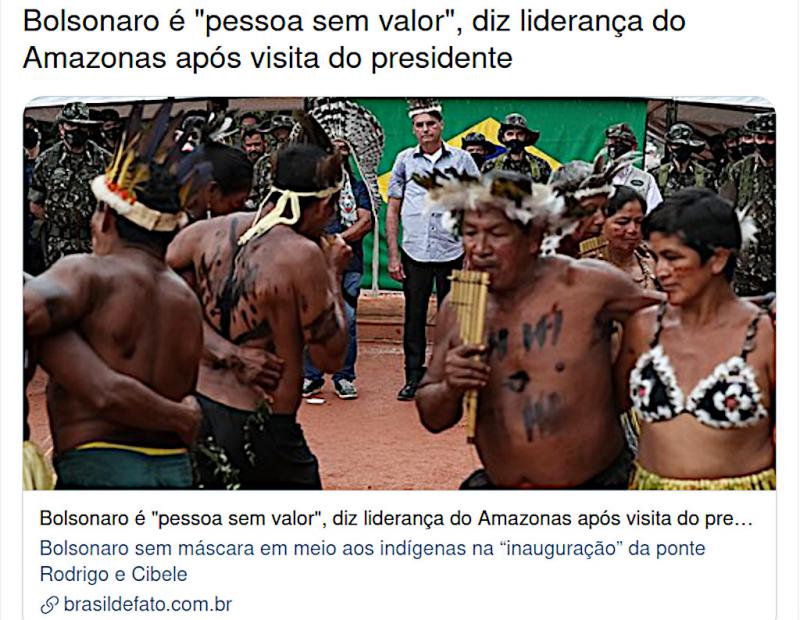 Brasilianische Medien kommentieren abschätzig "Maskarade" des Präsidenten (im Hintergrund) im indigenen Gebiet