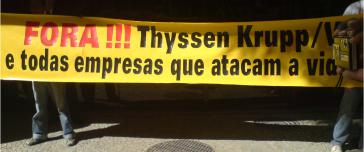 "Raus!!! Thyssen-Krupp und Vale und alle Firmen, die das Leben angreifen!" - Protestplakat in Rio de Janeiro Protest gegen Thyssen-Krupp / Vale in Rio