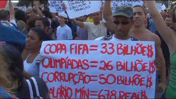 Proteste gegen Milliardenausgaben für WM und Olympia: “FIFA-WM: 33 Milliarden; Olympiade: 26 Milliarden; Korruption: 50 Millionen; Mindestlohn: 678 Reales” Proteste gegen Milliardenausgaben für WM und Olympia: “FIFA-WM: 33 Milliarden"