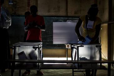 Wähler bei der Abstimmung in Delmas, Haiti am 9. August Wähler bei der Abstimmung in Delmas, Haiti am 9. August