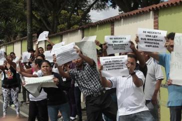 Arbeiterinnen und Arbeiter von "Maquilas" demonstrieren für sichere Arbeitsplätze und gleichwertigen Lohn