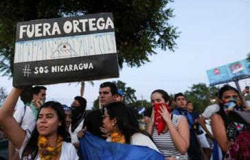 Eine Gruppe von Demonstranten in Nicaragua fordert den Rücktritt von Präsident Ortega Eine Gruppe von Demonstranten in Nicaragua fordert den Rücktritt von Präsident Ortega