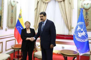 Die UN-Kommissarin für Menschenrechte, Michelle Bachelet, mit dem venezolanischen Präsidenten, Nicolás Maduro