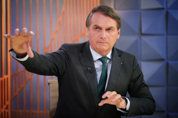 Der brasilianische Präsident, Jair Bolsonaro, macht Politik wie angekündigt und versucht so dem Staat seine rechten Ansichten überzustülpen Der brasilianische Präsident, Jair Bolsonaro, macht Politik wie angekündigt und versucht so dem Staat seine rechten Ansichten überzustülpen