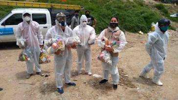 Soziale Organisationen verteilen in Kolumbiens Hauptstadt während der Corona-Pandemie Lebensmittel