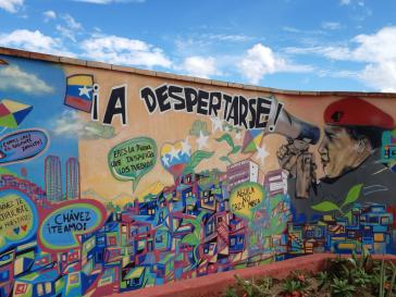 Hugo Chávez ist in dem Stadtviertel 23 de Enero auf Häuserwänden und Mauern stets präsent