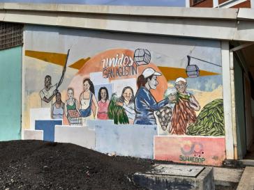 Wandbild der Kooperative San Agustìn auf einem ehemaligem Gebäude des unter Chávez installierten Mercal-Programms