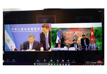 In einer virtuellen Zeremonie unterzeichneten Wang Wentao und Laureano Ortega das Abkommen