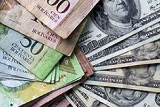 Bolívar- und US-Dollarscheine