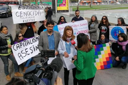 Die "Mujeres de Zona de Sacrificio Quintero - Puchuncaví en Resistencia" bei der Kundgebung vor dem Präsidentenpalast La Moneda in Chiles Hauptstadt Santiago